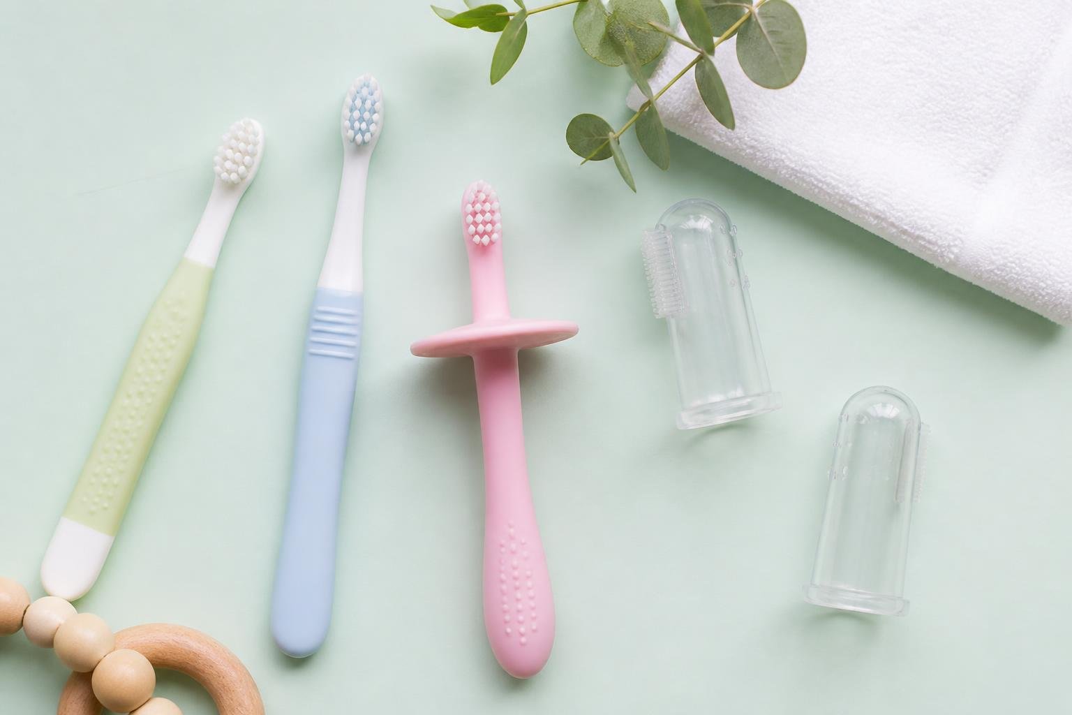 Best baby toothbrushes and silicone finger brushes for cleaning a baby's first teeth